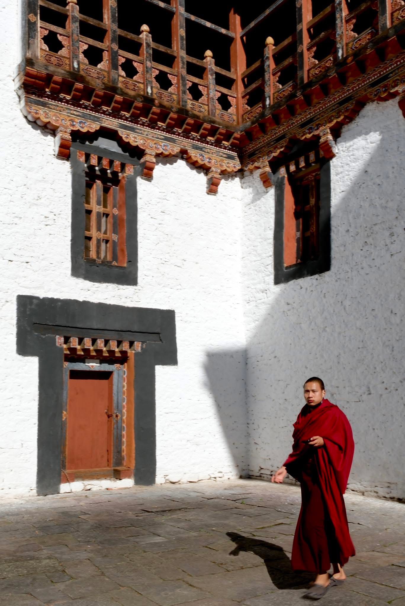 Monk in dzong courtyard
